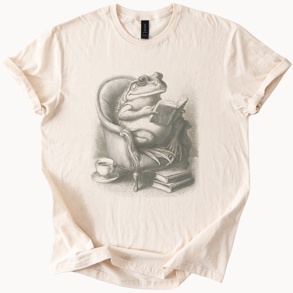 Literary Frog Graphic Tee Whimsical Reading Armchair Art